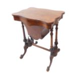 A mid 19th century serpentine-sided, figured walnut and marquetry work table; turned supports