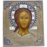 A 20th century Christ icon (probably Russian); hand-beaten frame with foliate designs, four