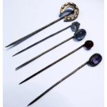 Five stickpins with various stones including amethyst and moonstone (5)