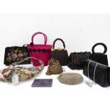 A varied selection of handbags and evening bags to include a floral tapestry example, a faux