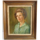 A mid 20th century framed oil on canvas shoulder-length study of a beautiful young lady with