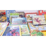 Four mid-20th century children's picture books and 16 printed and painted children's jigsaws and