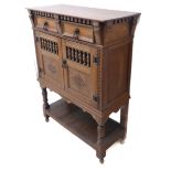 A 17th century style side unit/food hutch (probably early 20th century); the overhanging top with