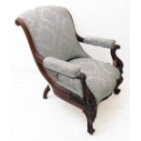 A good and heavy mid 19th century rosewood and upholstered library chair of generous proportions;