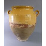 An unusual antique 19th century French traditional two-handled pottery confit jar; the top half with