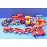 A good quantity of wooden 1970s toys to include two Escor tractors, a Disney pull-along train, a