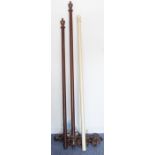 Three wooden curtain poles with fittings and curtain rings (35 brown, 18 cream; approx. length