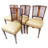 A good set of four Edwardian mahogany and boxwood strung salon chairs; each with central vertical