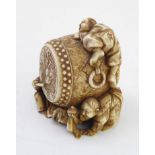 A good Japanese Meiji period (1868-1912) ivory netsuke; finely carved and modelled as four young