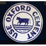 A large blue and white enamel sign 'Use Oxford Cement', signed to the bottom 'Barltrop, Oxford' (