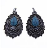 A pair of silver earrings of leaf-shape set with pear-shaped turquoise (boxed)