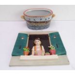 A large mid-20th century hand-decorated pottery (probably German or Swiss) plaque  - young girl at a