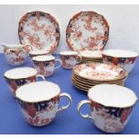 A six-place Royal Crown Derby tea service (numbered 2712): cups and saucers, side plates, two 22cm