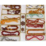 15 boxed necklaces to include coral, amber and 19th century examples