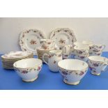 A 12-place Old Royal Bone China tea service comprising 2 two-handled cake plates (24cm), cups,