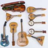 Ten well-made miniature stringed instruments to include two acoustic and one electric guitar, two