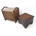 An early 20th century oak sewing box/stool; the hinged floral needlework top above a single full-