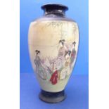 A large early 20th century Japanese pottery vase of baluster form depicting female figures