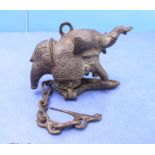 A hanging cast oil lamp/incense burner modelled as an elephant, together with a hanging chain