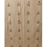 A pair of curtains in a linen fabric embroidered with sprigs of flowers, thermal lining with cream