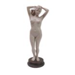 A composition sculpture model of a standing female nude on a circular socle, signed Johnson and