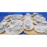 Eight early 20th century Japanese trembleuse-type cups and saucer-plates decorated with varying