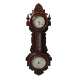 A late 19th century combined clock thermometer and barometer; nautical themed carved oak case with