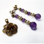 A pair of 9-carat gold amethyst and seed pearl earrings and a 9-carat gold tiger's eye pendant