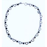 A fully hallmarked silver necklace modelled as alternating hearts (45.5cm)