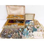 Two jewellery boxes containing a good and wide selection of various costume jewellery to include