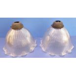 A pair of flowerhead-shaped glass shades with fluted edges (22cm diameter)