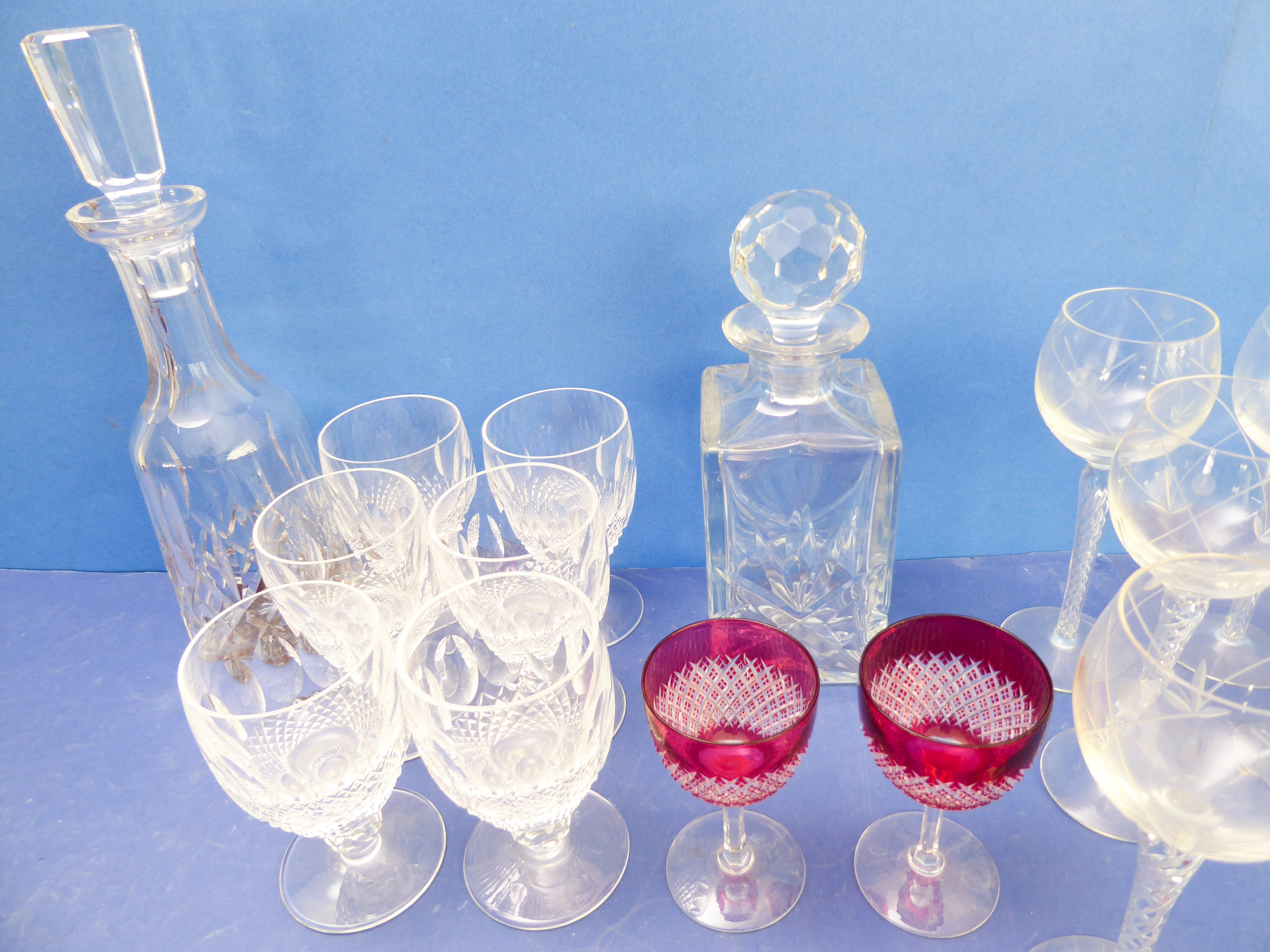 Fine quality glassware to include a hand-cut Spode decanter, a hand-cut mallet-shaped decanter, a