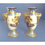 A matched pair of late 19th century Japanese vases decorated in the Imari palette (one vase