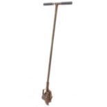 An antique two-handled iron lawn edger (probably early 20th century) (109cm)