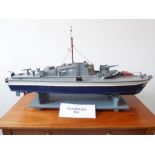 A hand-built bespoke model of a Norwegian gunboat on stand (92cm long x 26cm widest)