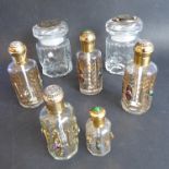 Two glass jars by ANN CICHON (Dallas): ornate metal mounted lids, together with three matching 'be-