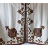 A  pair of magnificent handmade curtains in cream silk quilted fabric with a unique design of