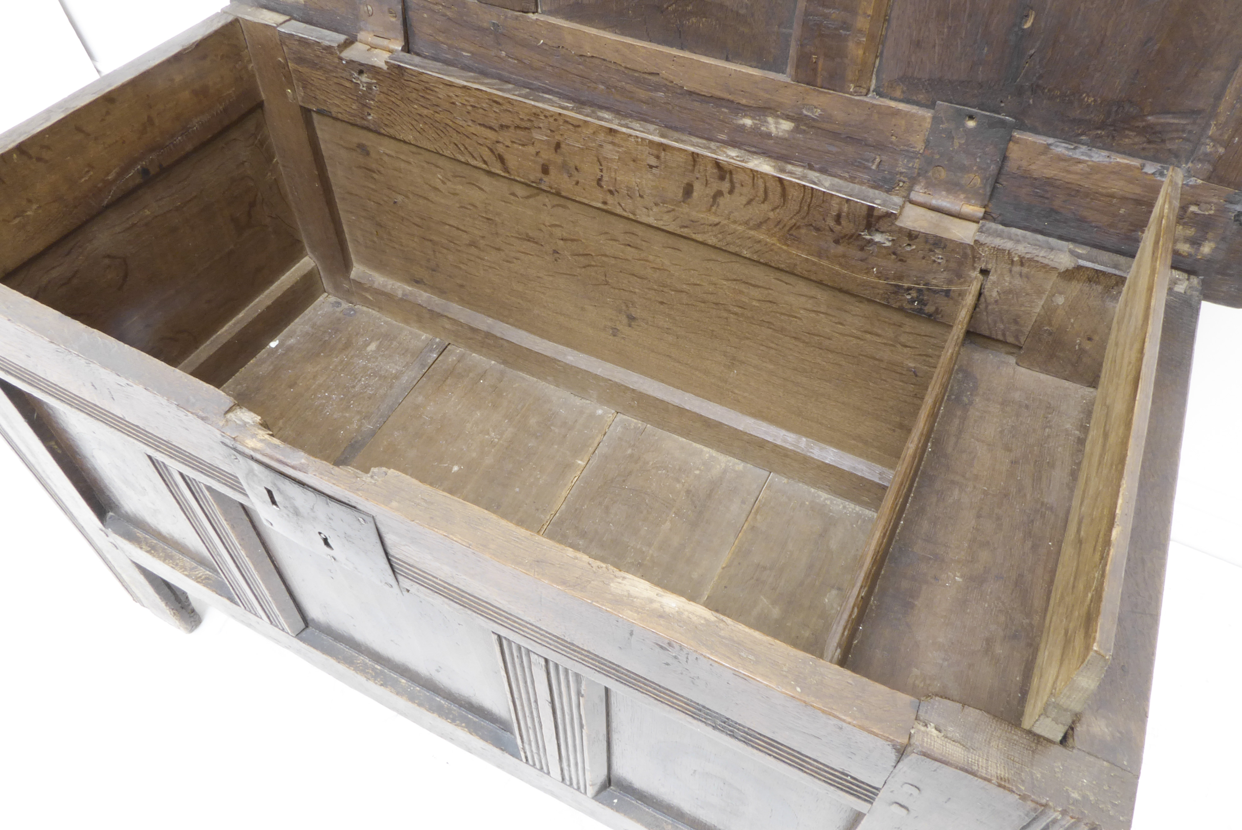 A late 17th / early 18th century oak chest of small proportions: the three-panel scratch moulded top - Image 6 of 6