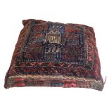 An early 20th century Belouch bag stuffed as a cushion; blue field with stylised birds. Good