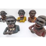 Five cast-iron novelty money banks (mostly 19th century): one 'Dinah', two 'Jolly Man' and two