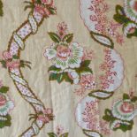 A pair of floral patterned curtains on a heavy cotton/linen fabric with decorative scallop edge