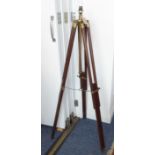 A 19th century style (later) brass mounted mahogany adjustable lamp standard formed from a tripod: