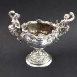 A very fine and heavy late 19th century two-handled silver salt of Tudor form; oval bombe-shaped