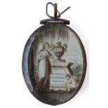 A late 18th/early 19th century rose-gold coloured oval-framed and glazed memento mori; the obverse