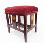 A late 19th / early 20th century mahogany stool attributed to Shapland & Petter: later red-velour