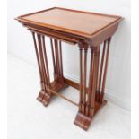 A good set of four stainwood and rosewood crossbanded quartetto tables: the turned uprights with