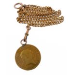 A George III half guinea pendant dated 1808, suspended from a yellow gold curb link chain necklace