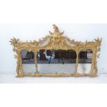 A fine 19th century triple-plate overmantle looking glass in high mid-18th century Rococo style: