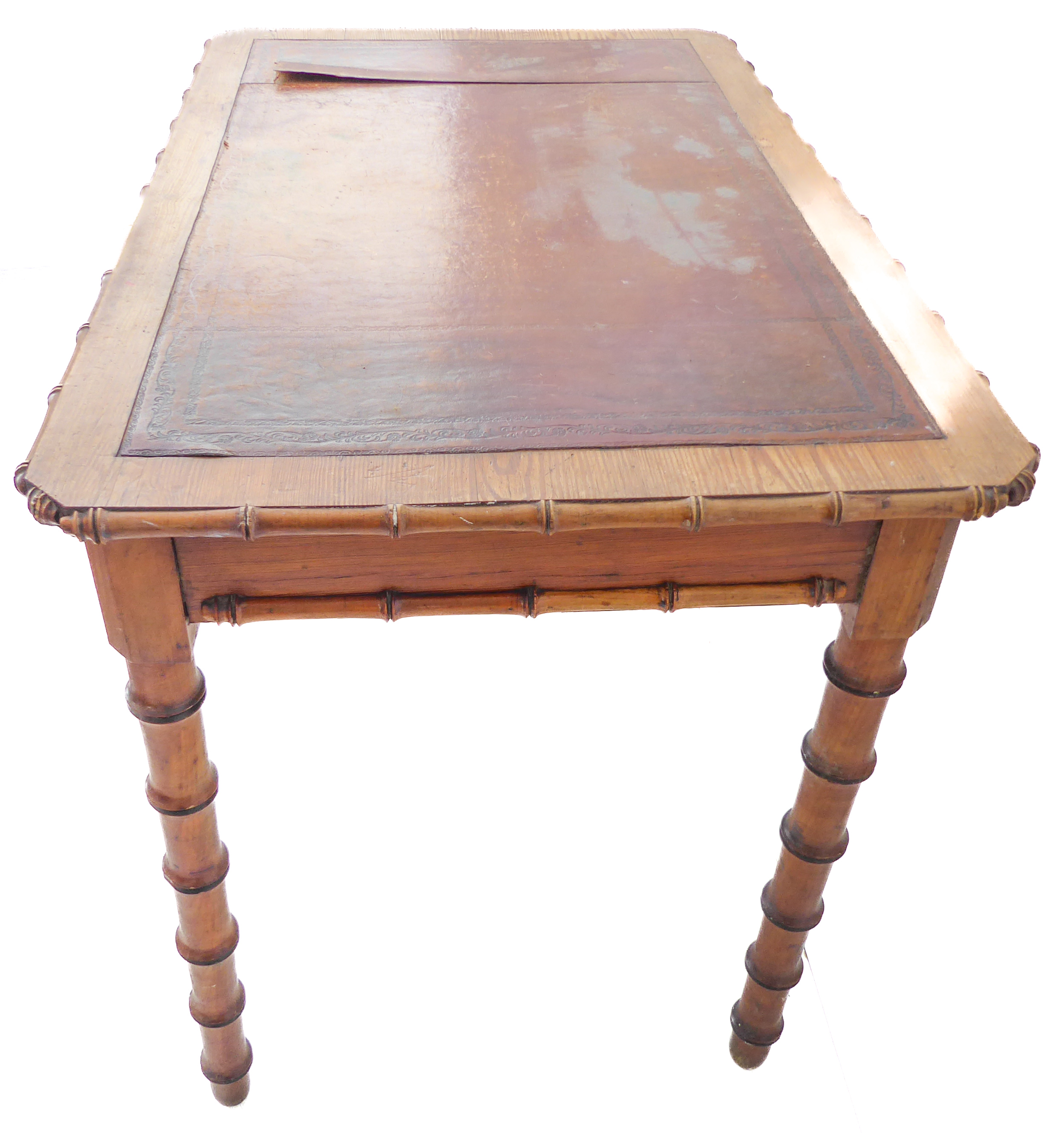 A late 19th century Aesthetic movement Oregon pine writing table: the leather inset top with faux - Image 4 of 5