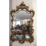 A large and heavy mid 18th century style (probably late 19th century) gilt metal-framed Rococo